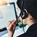 woman talking on headset in call center